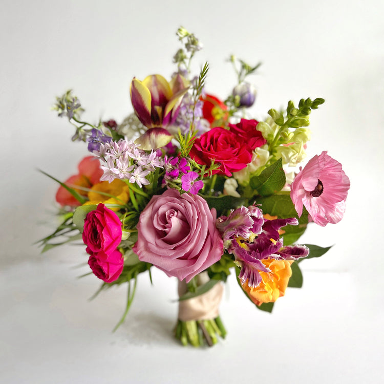 Petite bridal bouquet with multiple types of fresh cut flowers. Created by expert florist at Everbloom Design in Memphis, TN.