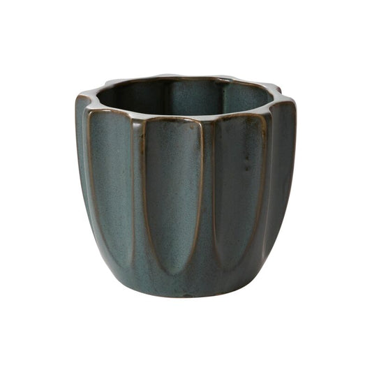 Dark green ceramic planter with ribbed texture on a white background