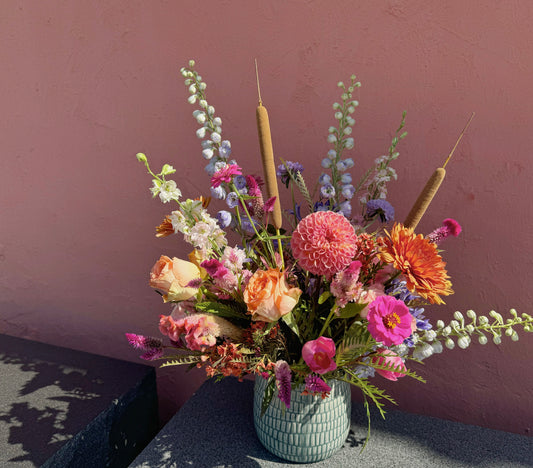 seasonal arrangement with cat tail in custom vase handcrafted