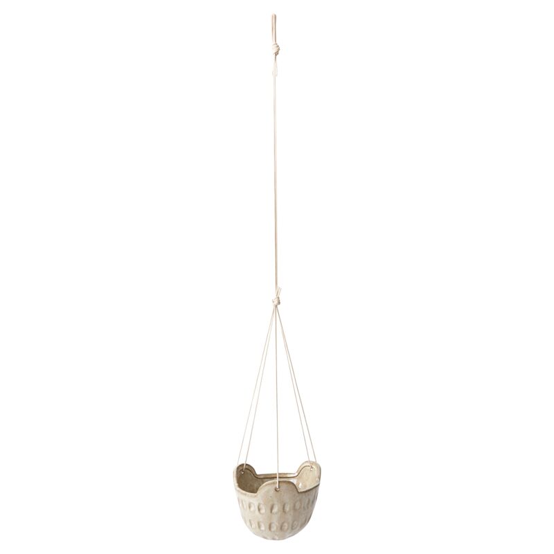 Hanging planter with a spot design on a white background