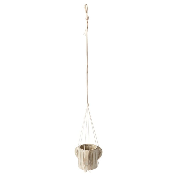 Hanging planter with a neutral color scheme on a white background