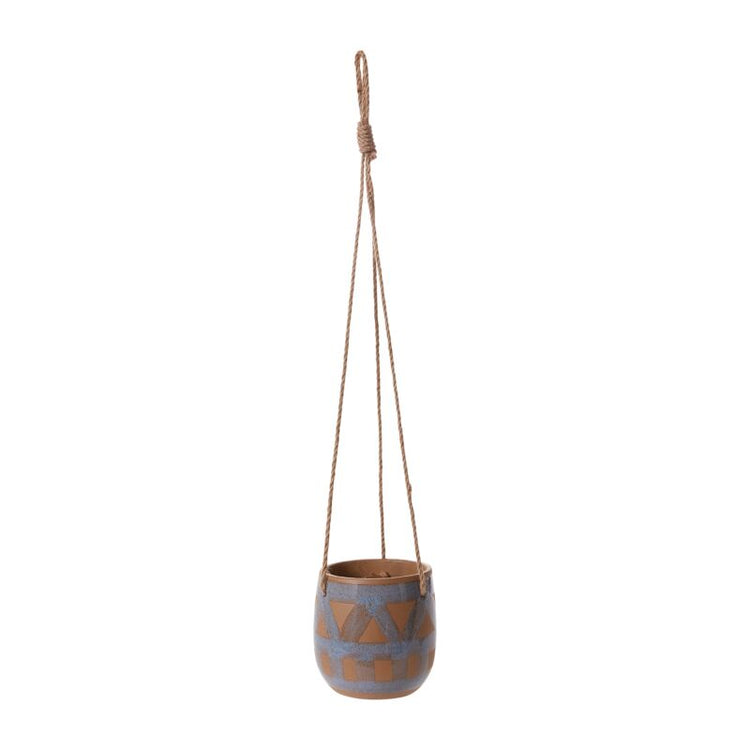 Hanging planter with geometric pattern on a white background