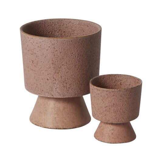 Two brown ceramic planters of different sizes on a white background