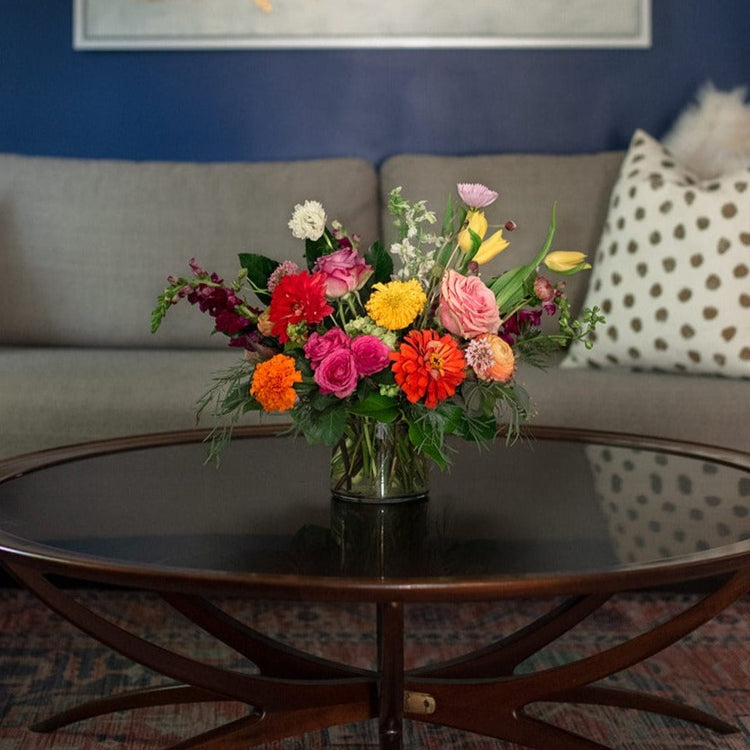 Classic arrangement pictured in cylindrical glass vase.  Floral arrangement completed by Everbloom Design a Memphis flower shop.